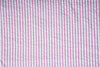Rayures bonbon rose sur blanc en seersucker