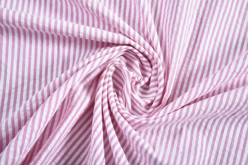 Rayures bonbon rose sur blanc en seersucker