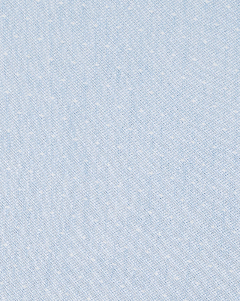Polo bleu clair à pois