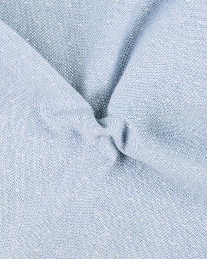 Polo bleu clair à pois