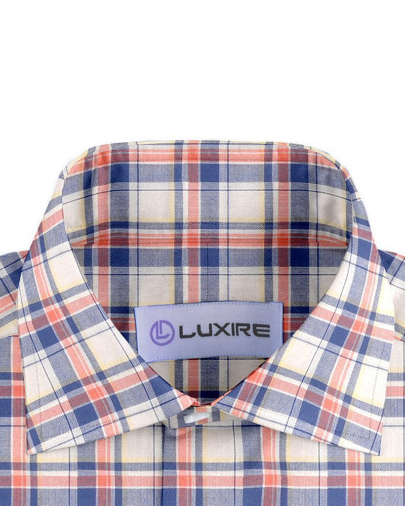 Blaue orange Tartan-Karos auf Gelb